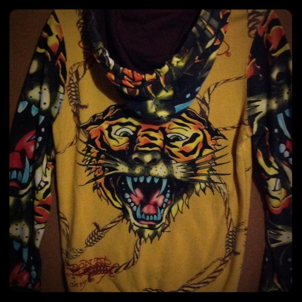 Zip up hoody with a tiger on back,